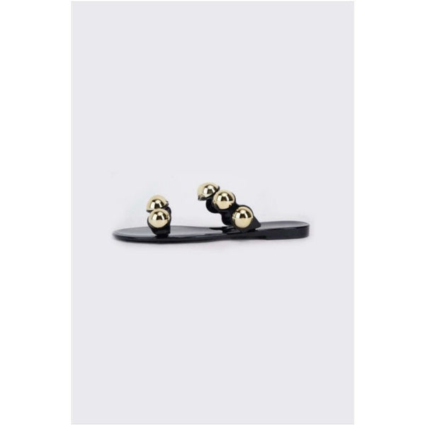 Black jelly sandals with gold studs